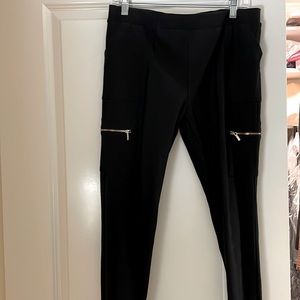 Bebe black dress leggings with gold zippers.
